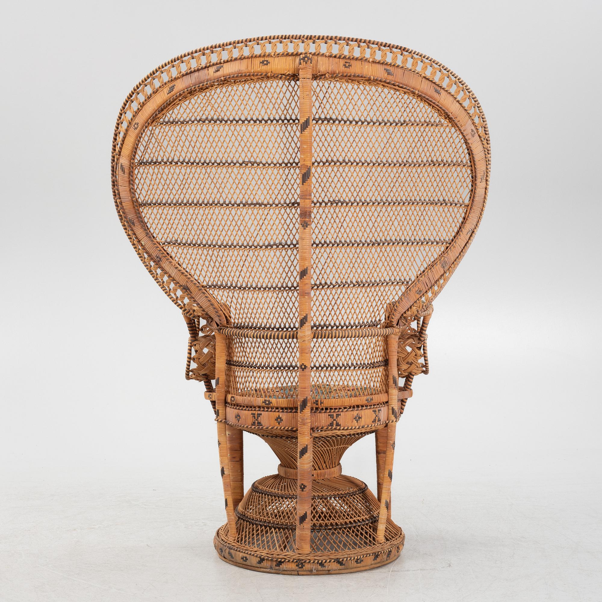 A peacock rattan chair, 20th Century.