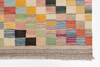 A Kelim carpet, c. 253 x 182 cm.