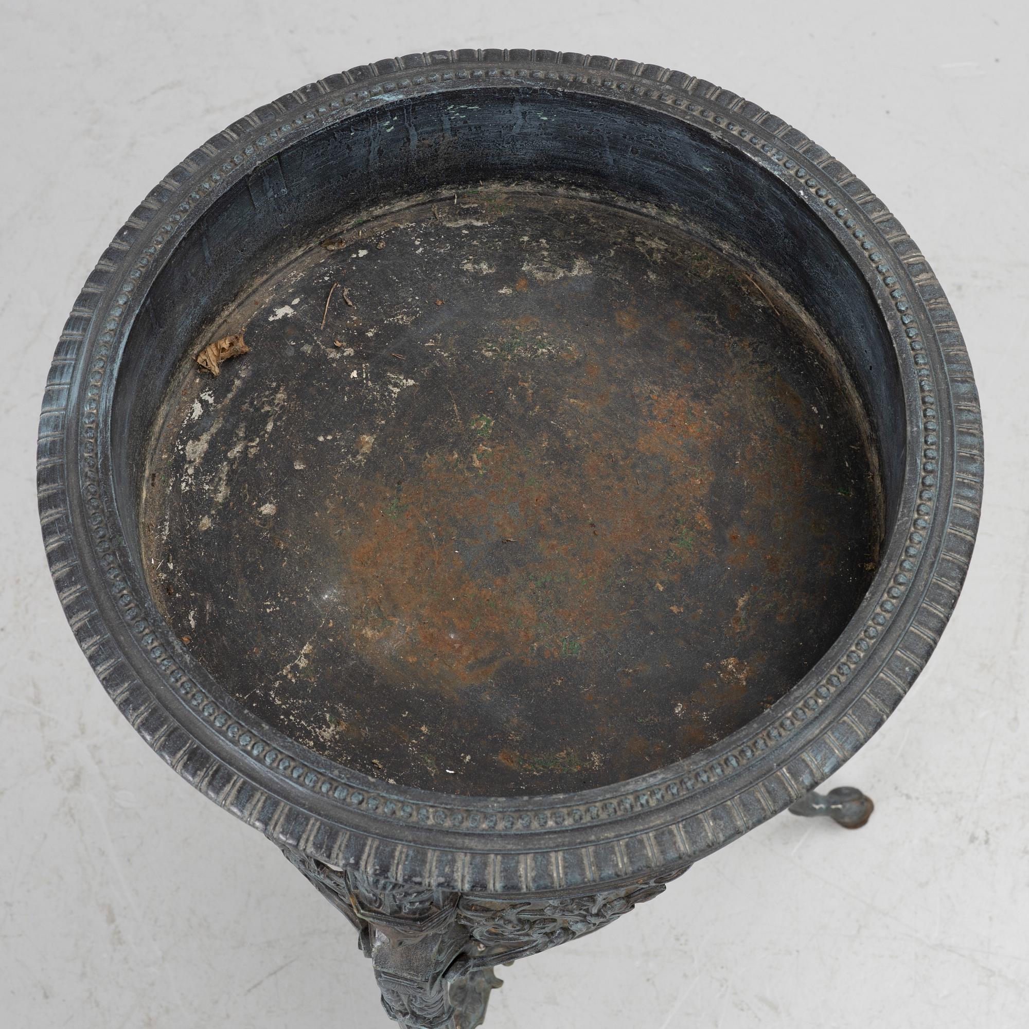 A plant stand, late 20th century.