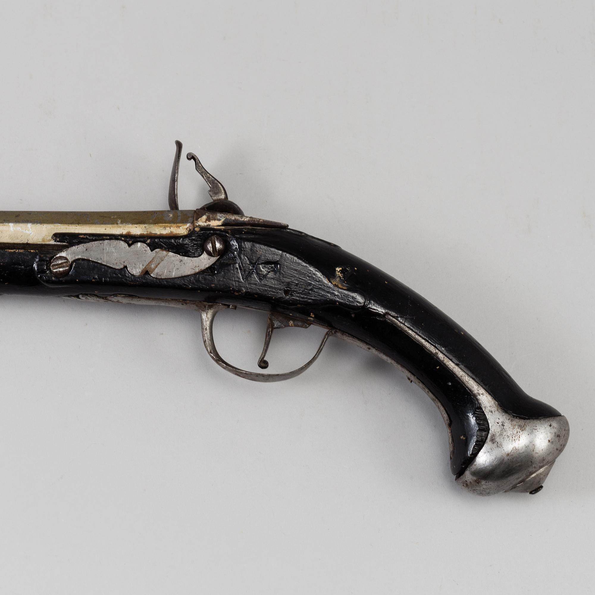 One flint lock postol, late 18th ct, and one percussion pistol, 19th ct.