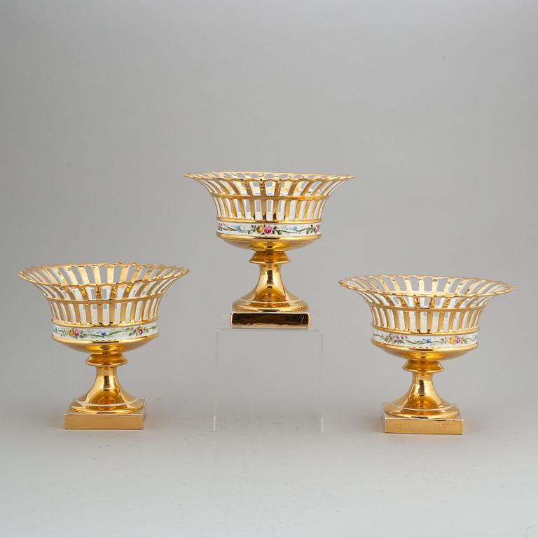 Three Rörstrand porcelain footed chestnut baskets, circa 1900.