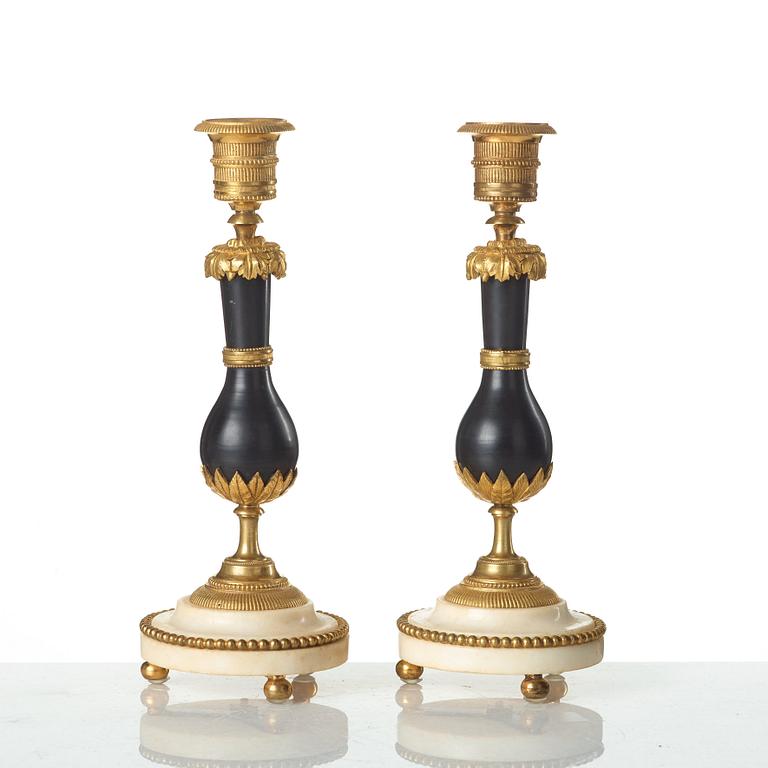 A pair of Louis XVI late 18th century candlesticks.