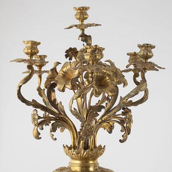 A pair of gilt-brass and satsuma ware seven-light candelabra, the porcelain Meiji period (1868-1912).