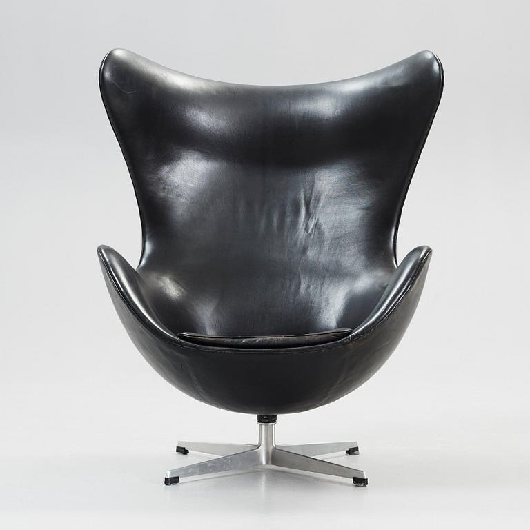 An Arne Jacobsen black leather 'Egg' chair, Fritz Hansen, Denmark 1964.