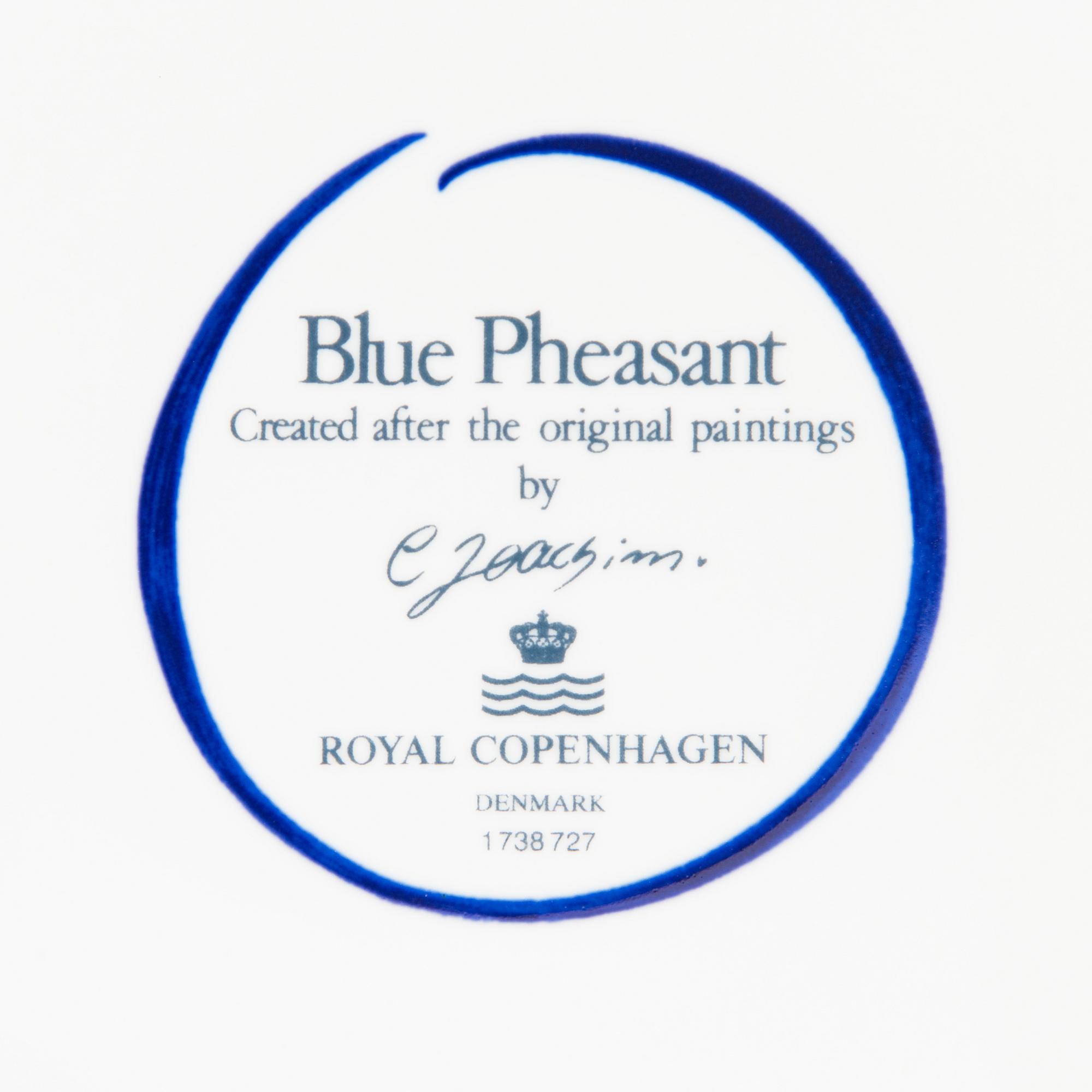 CHRISTIAN JOACHIM, A 92 parts set of  'Blue Pheasant' from Royal Copenhagen, late 20th century.