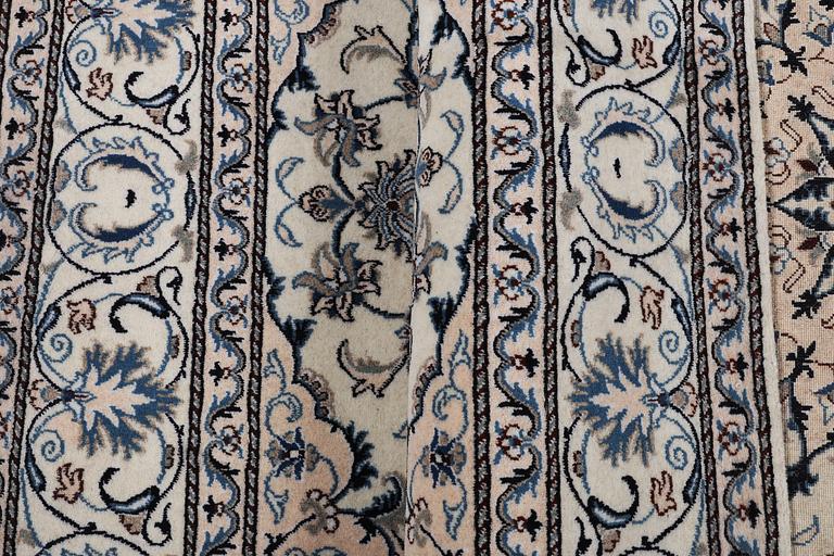 A rug, Nain, part silk, ca 200 x 195 cm.