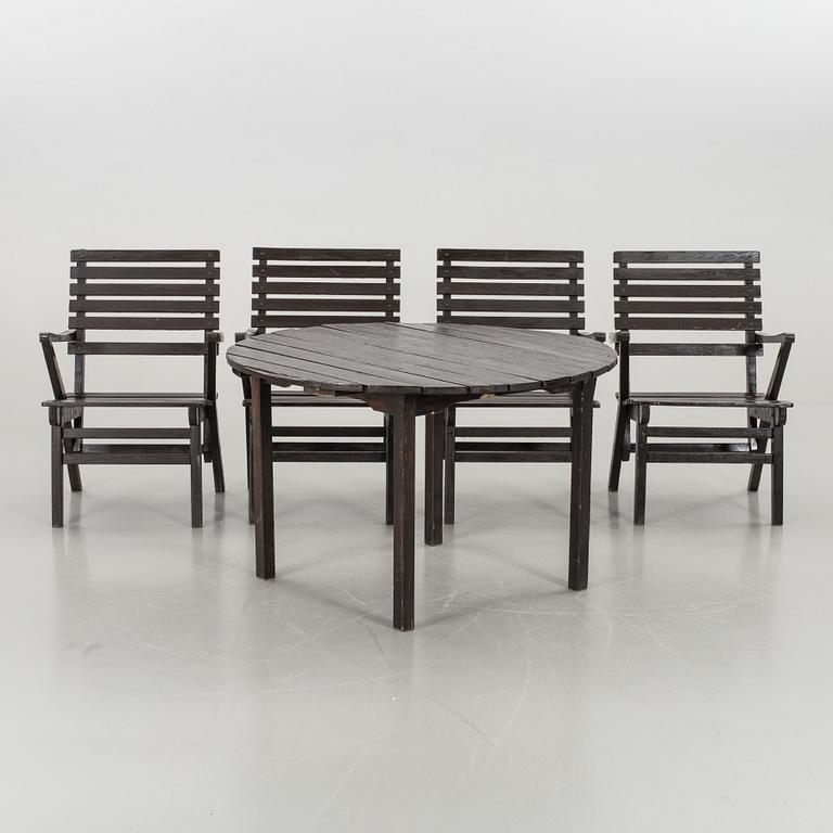 CARL MALMSTEN, garden furniture 'Bergshamra', four chairs and a round table. Mid 20 th century.