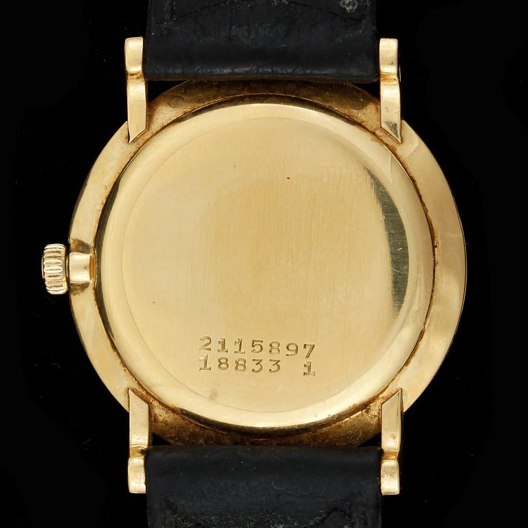 ARMBANDSUR, herr, 18k guld, Universal, Geneve, 1950-tal.