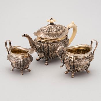 A three piece silver tea set, Albert Henry Thompson, Sheffield, England, 1896.