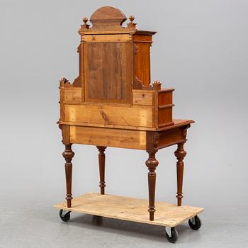 A late 19th century walnut veneered desk.