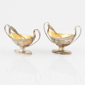 A pair of Gustavian silver and parcel-gilt salt cellars, one with mark of Petter Eneroth, Stockholm 1799.