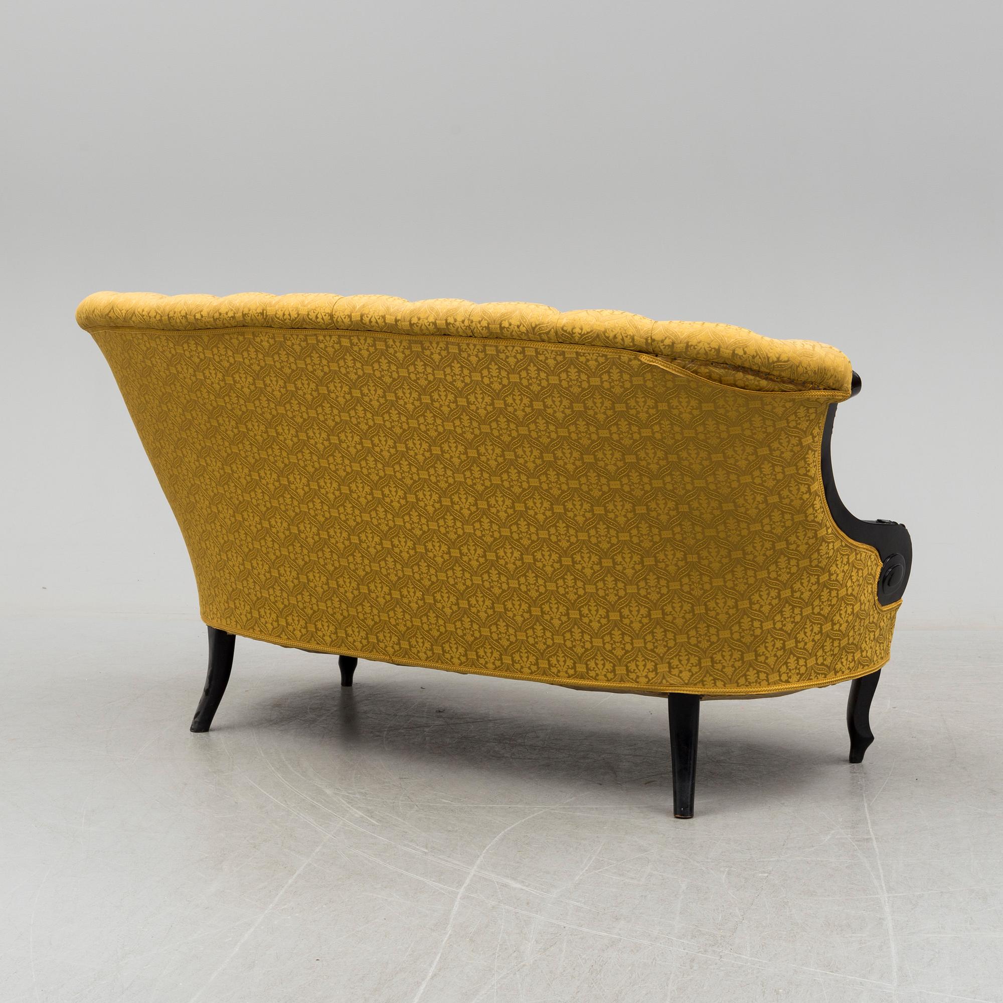 A set of three chairs, two easy chairs, one sofa and one table, end of the 19th century.