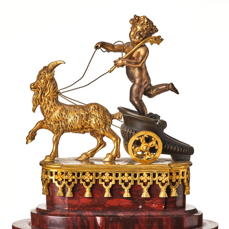 A French Empire 19th century gilt bronze mantel clock signed Lamiral.