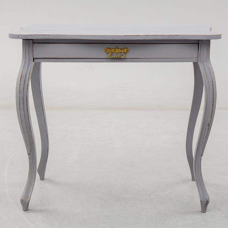 A circa 1900 Rococo style writing desk.