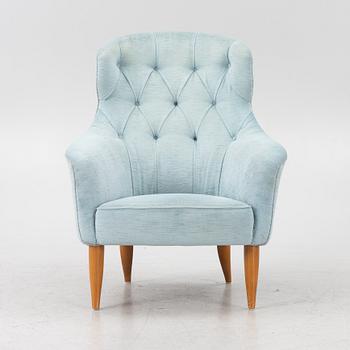 Kerstin Hörlin-Holmquist, an 'Onkel Adam' armchair, Triva series, Nordiska Kompaniet's workshops in Nyköping.