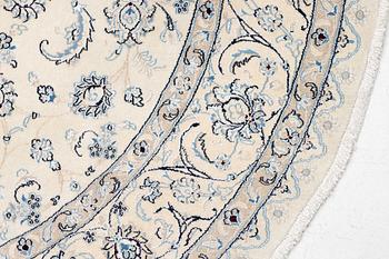 A Nain rug, diameter a. 247 cm.