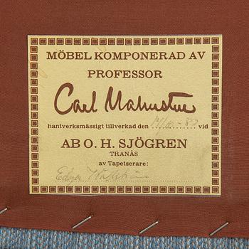 A second half of the 20th Century armchair by Carl Malmsten.