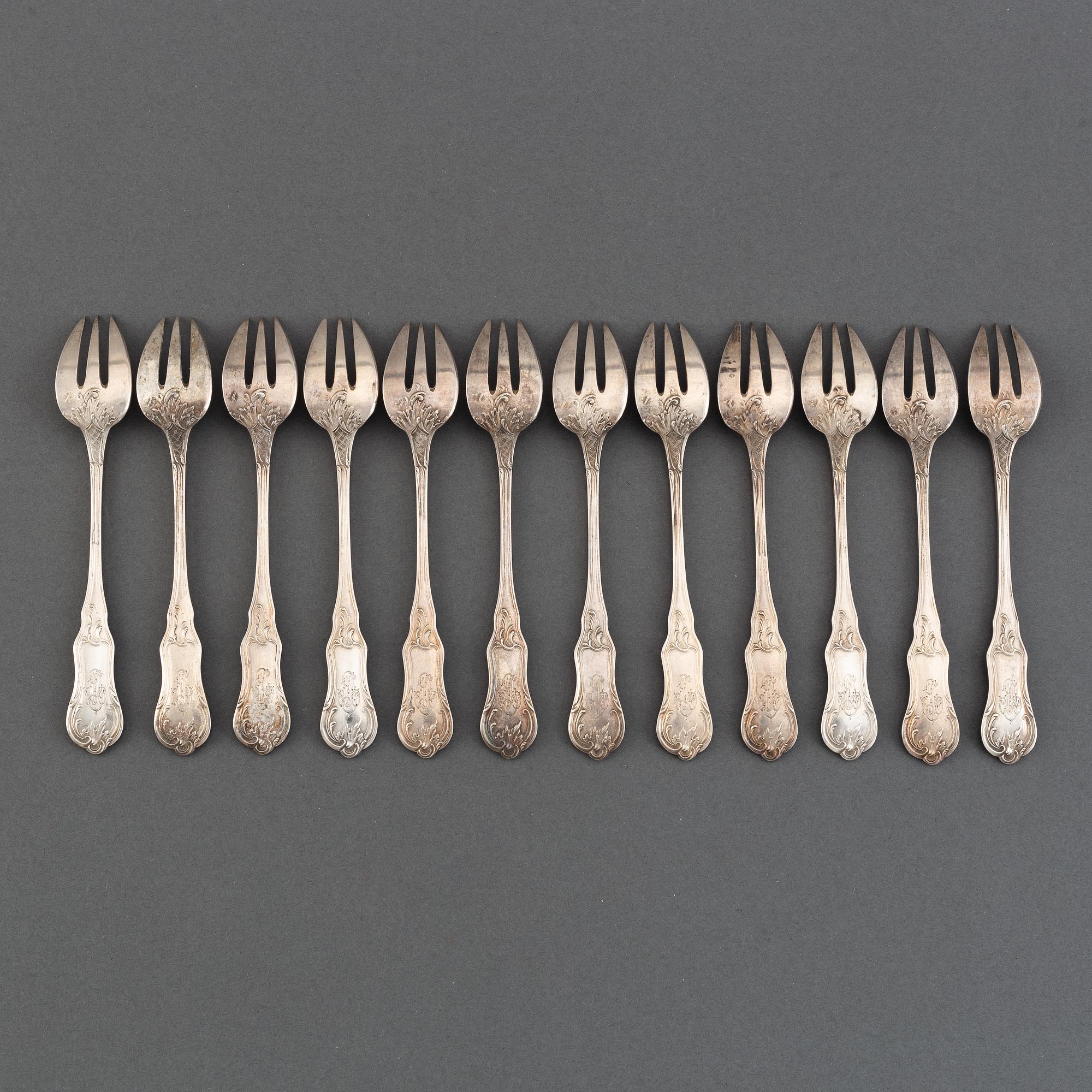 A set of twelve French silver oister-forks, after 1838.