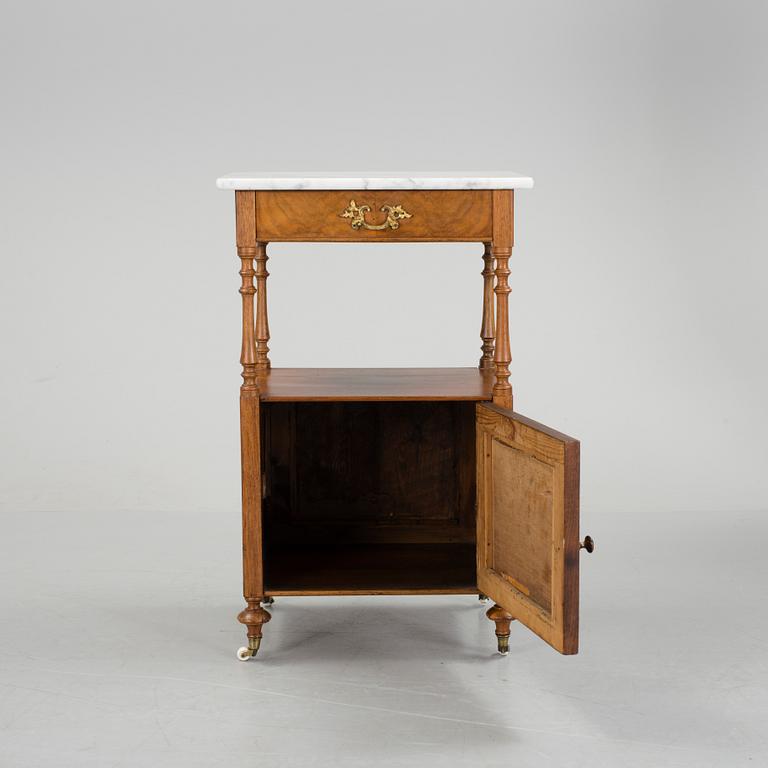 A walnut and mahogany bedside table, late 19th Century.