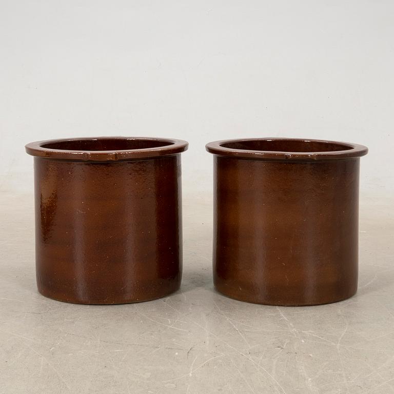 outer casing/vessel a pair of glazed ceramics.