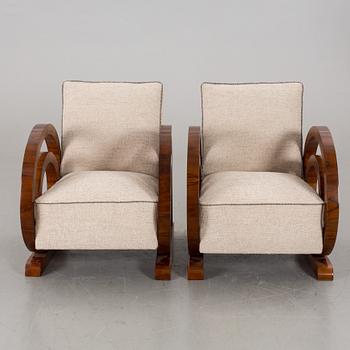 A pair of Art Deco armchairs.