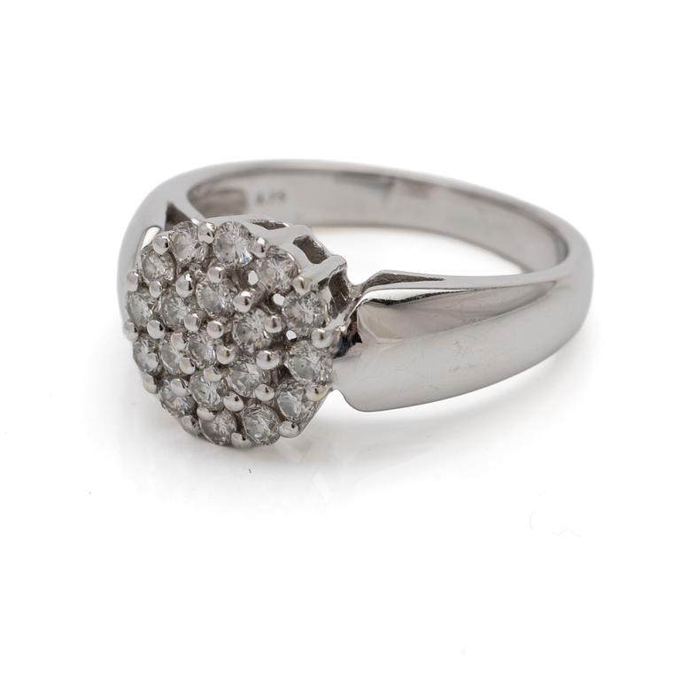 18K white gold ring with diamonds.