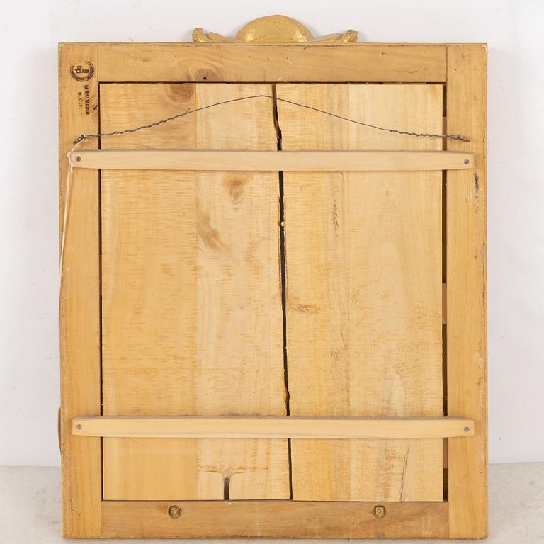 A "Meunier" mirror wall lamp from IKEA's 18th-century series, late 20th century.