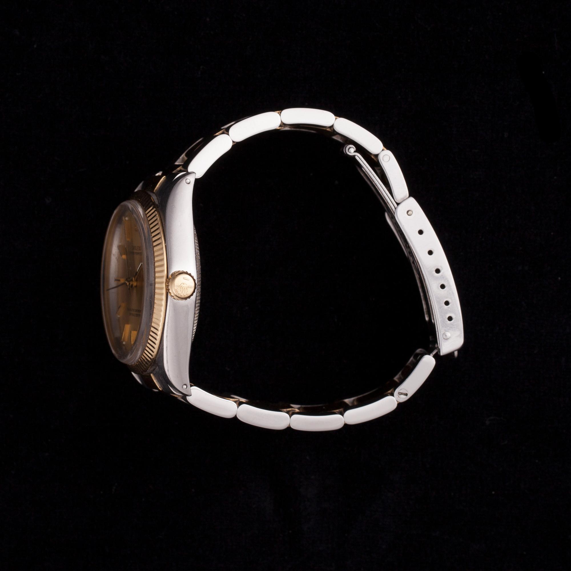 RANNEKELLO, miesten, Rolex Oyster chronometer. Terästä ja kultaa. 1900-luvun loppu.