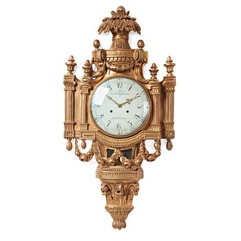 119. A Gustavian wall clock by Hans Wessman (active in Stockholm 1787-1805).