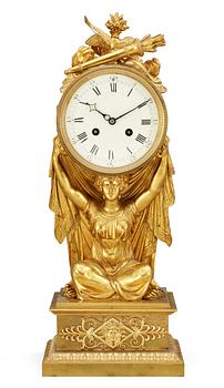 A French Empire early 19th century gilt bronze mantel clock.