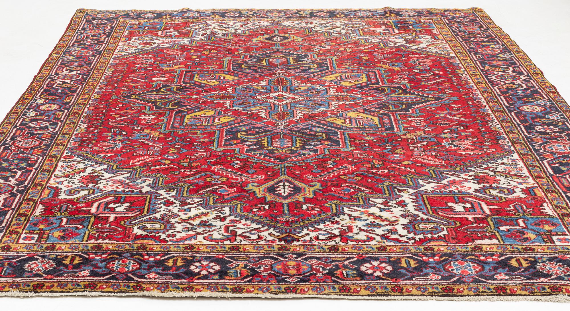 A carpet, Heriz, ca 315 x 243 cm.