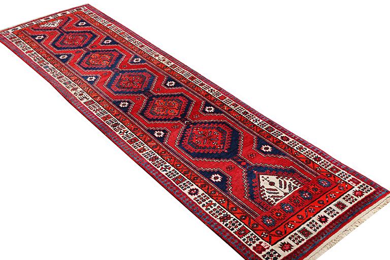 A runner carpet, Ardebil, c. 392 x 103 cm.