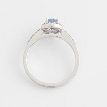 Ring with oval sapphire and brilliant-cut diamonds.