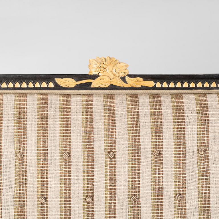 A gustavian style table and sofa, around the year 1900.