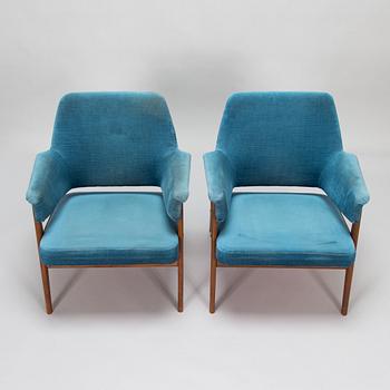 A pair of mid 20th century armchairs.