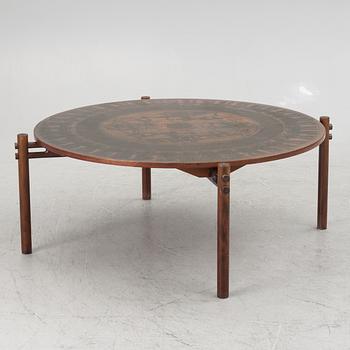 A mid20th century coffee table.