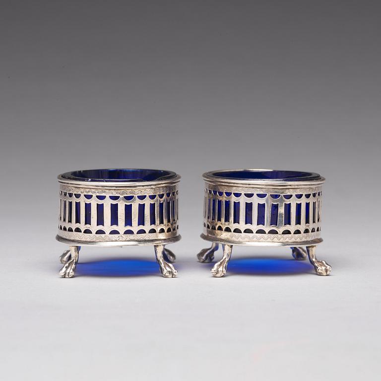 A pair of Swedish 18th century silver and blue glass salt cellars, mark of Pehr Zethelius, Stockholm 1791.