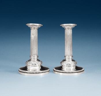 A pair of Swedish 18th century silver candelsticks, makers mark of Petter Eneroth, Stockholm 1786.