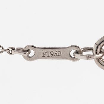 Tiffany & Co, Elsa Peretti, a platinum cross pendant necklace.