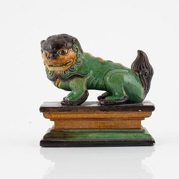 A Chinese figure of a buddhist lion, Qing dynasty, 19th Century.