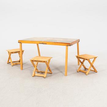 A portable picknick table and stools mid 1900s.