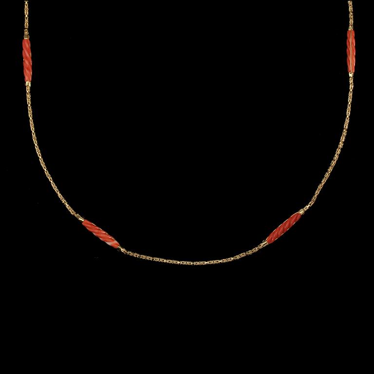 A coral necklace.