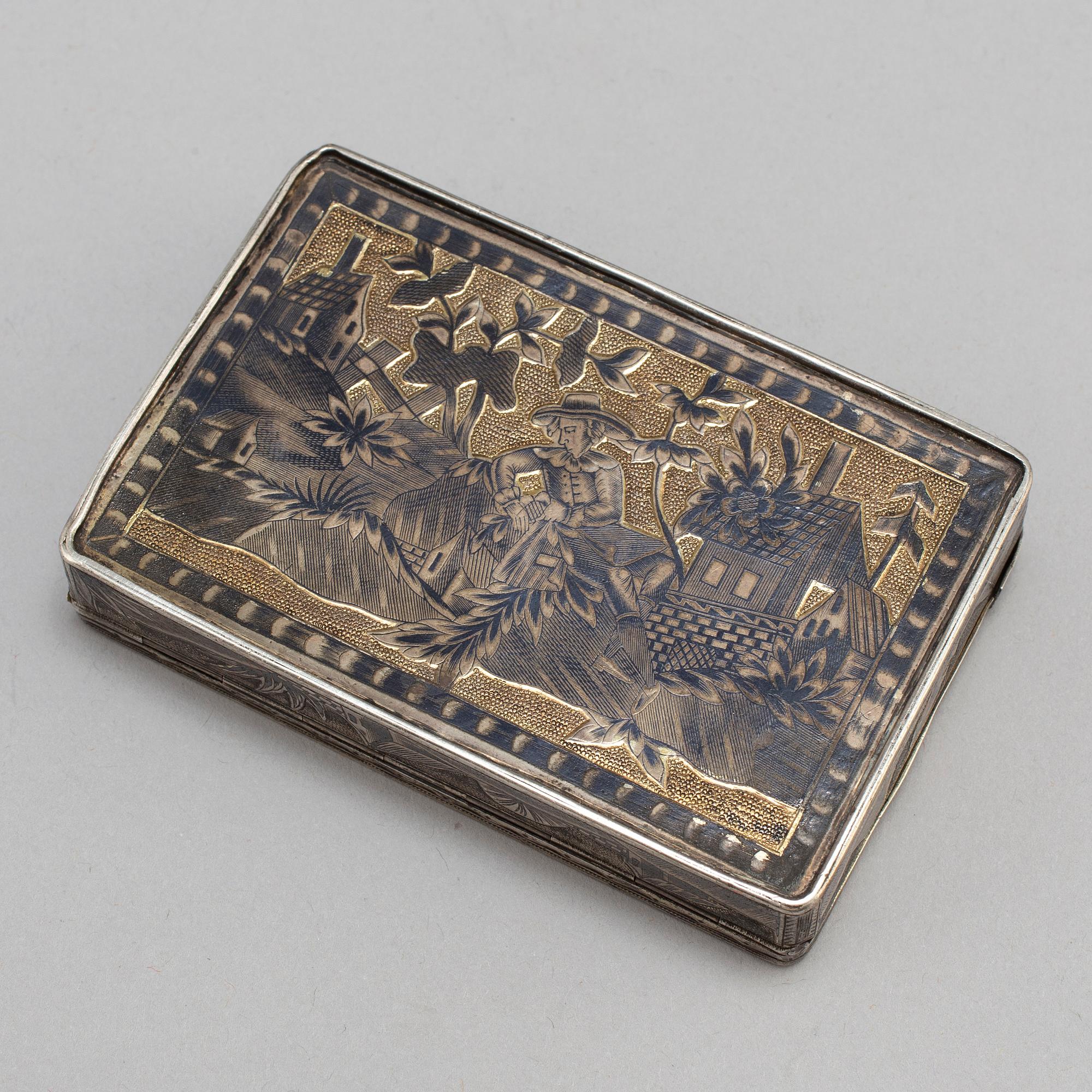 A Russian mid 19th century silver-gilt and niello snuff-box, mark of Moscow.