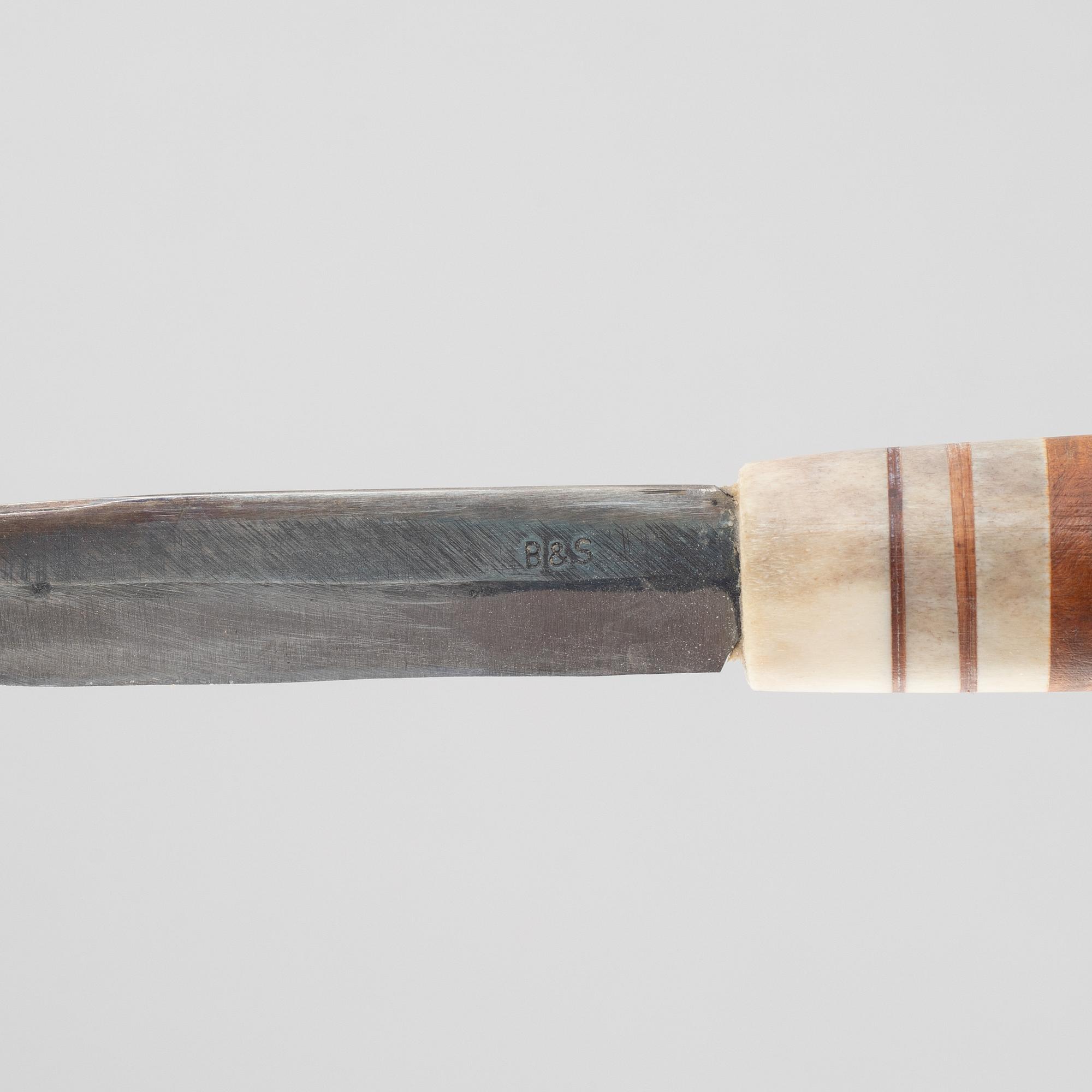Olof Tomas Svonni, a reindeer horn knife, signed.