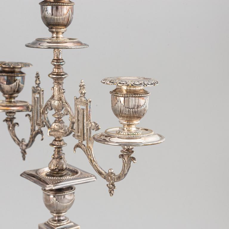 A pair of silver plated candelabras, early 20th century.