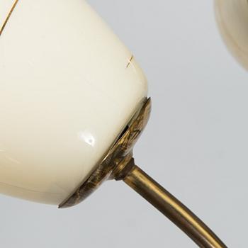 A mid-20th-century brass ceiling light, Finland.
