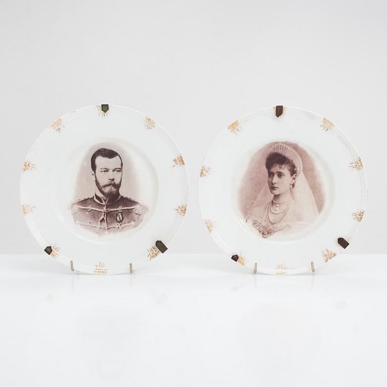 A pair of porcelain plates for Hache & Co, France.
