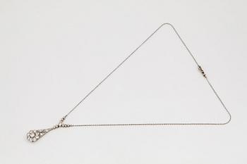 A platinum necklace set with old- and eight-cut diamonds.