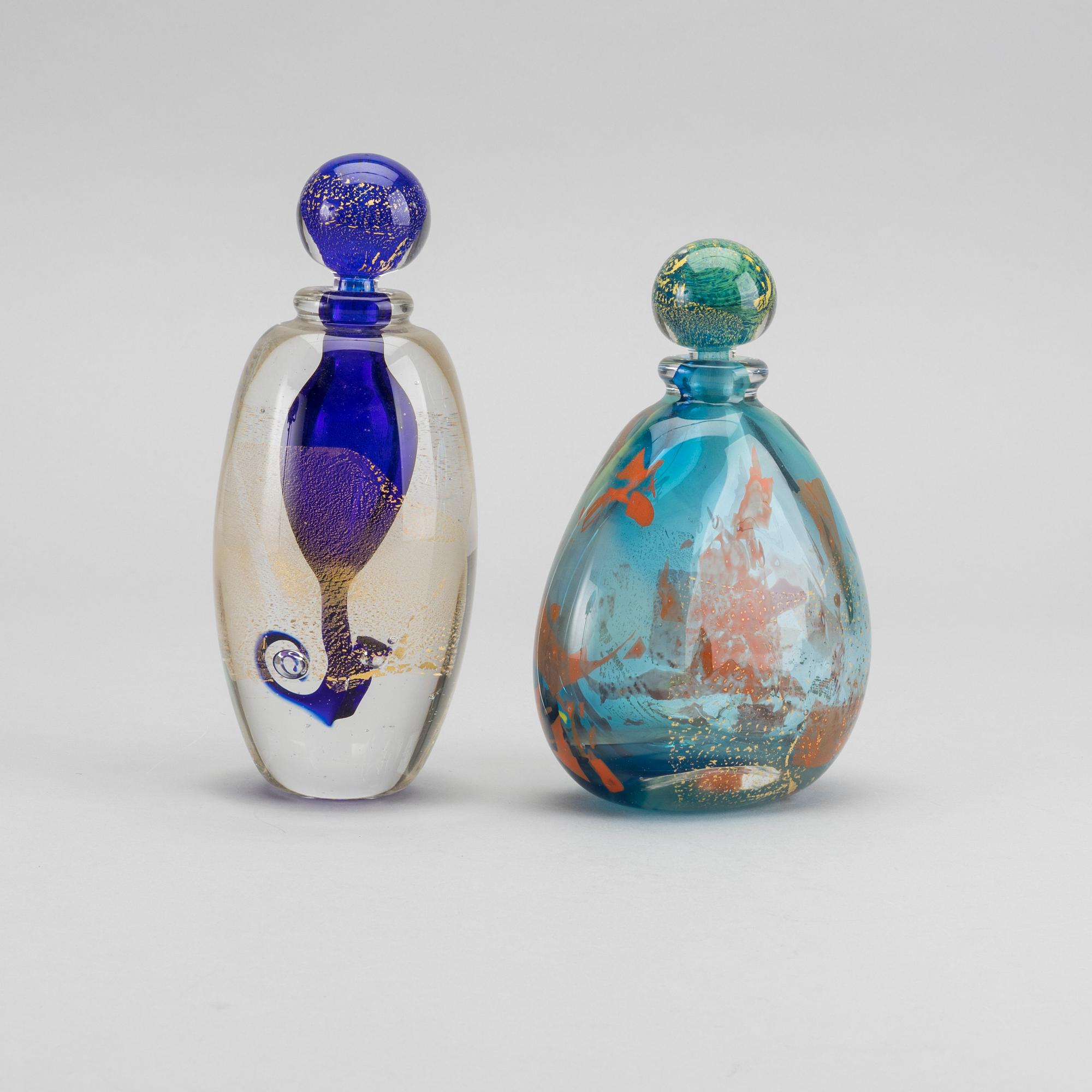 MARCEL SABA, a set of two signed glass flacons.