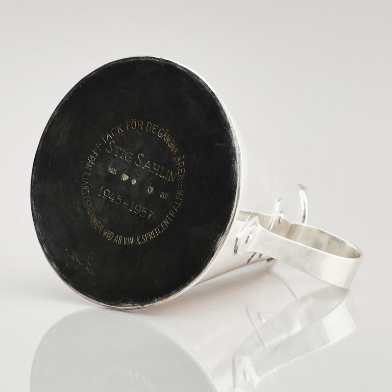 G H Markenius, a silver pitcher with handle, Stockholm 1957.